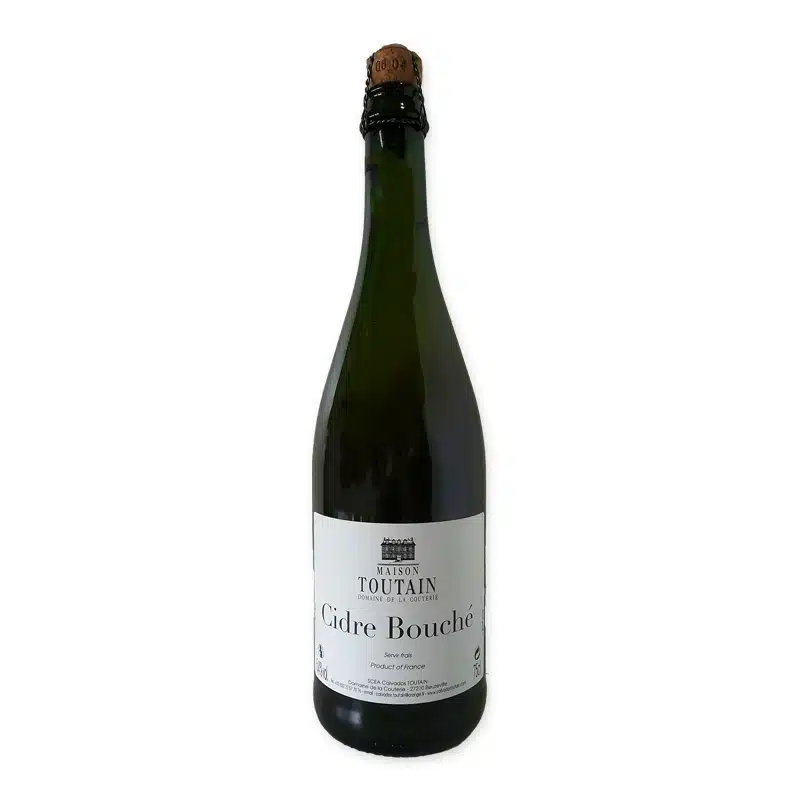 Ontdek Toutain Cidre de Pomme Bouché, een ambachtelijke Franse cider die perfect samengaat met kazen en fruitdesserts. Koel serveren voor de beste smaakervaring.